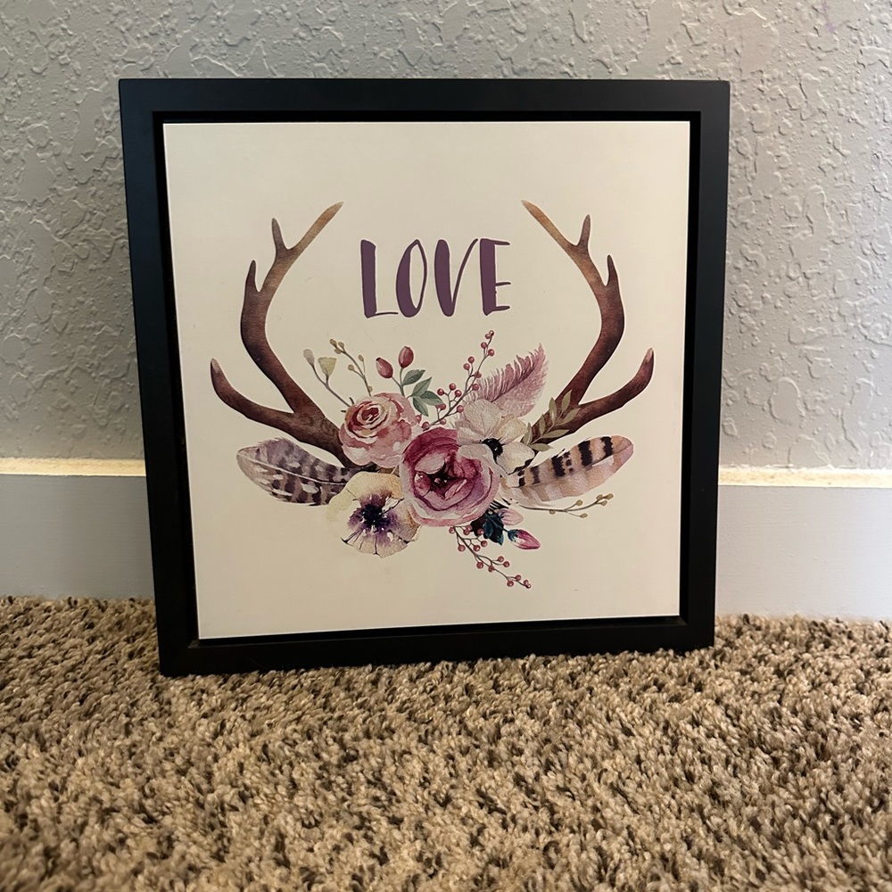 Deer antler and floral wall decor
